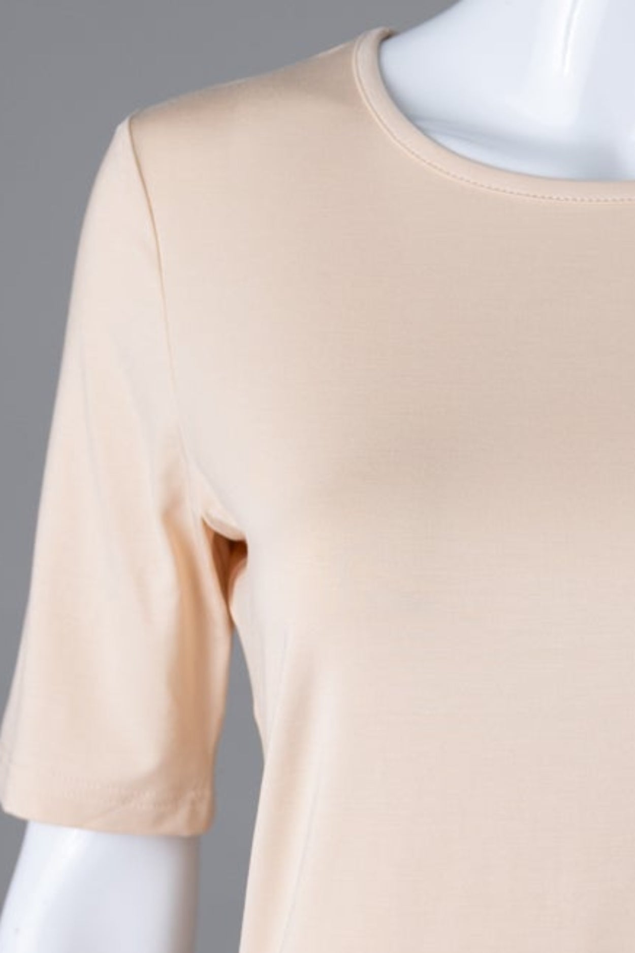 Model wearing Nuggles®  Half Sleeve Essential Tee in Nude