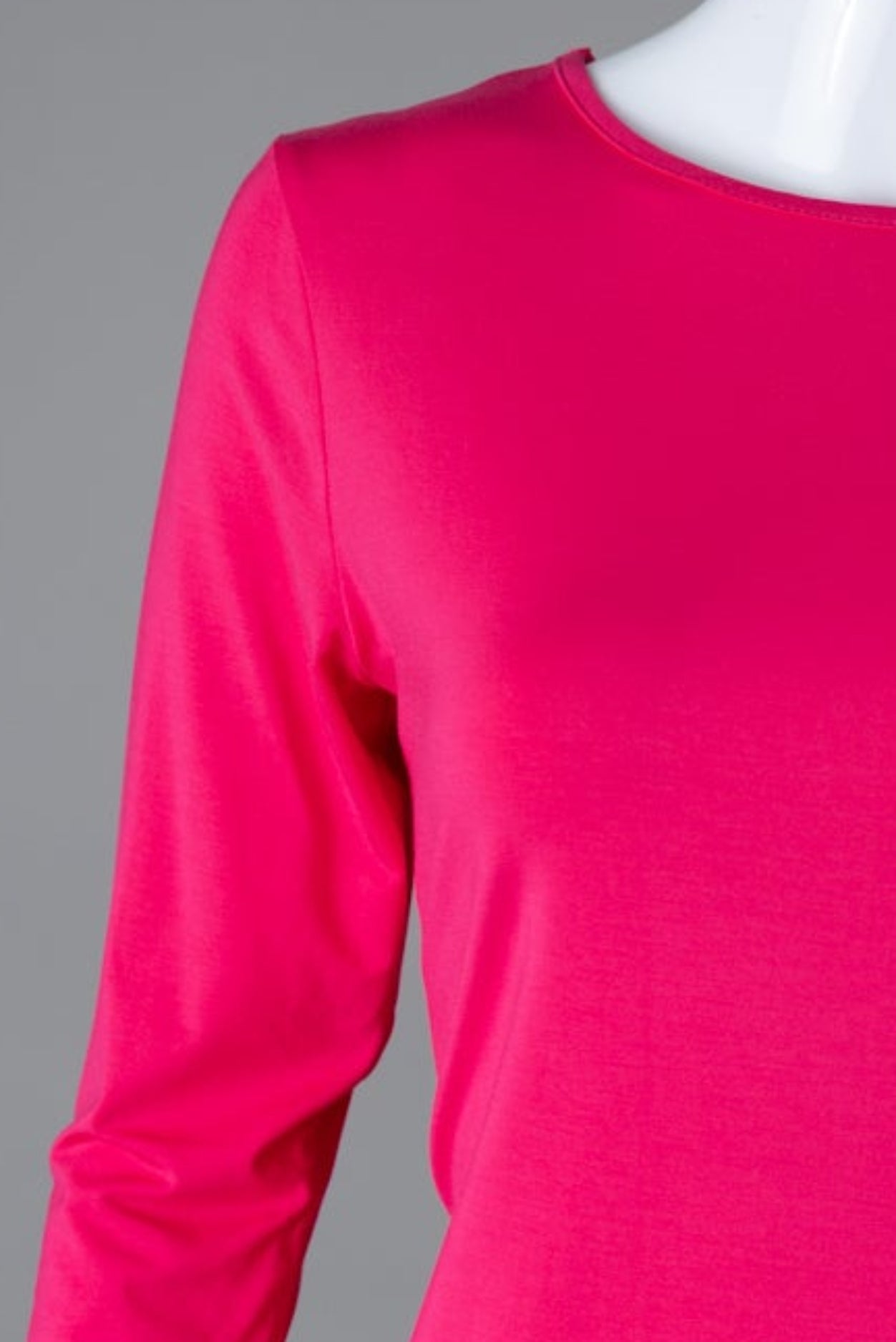 Model wearing Nuggles® 3/4 Essential Tee in Hot Pink