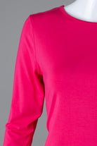 Model wearing Nuggles® 3/4 Essential Tee in Hot Pink