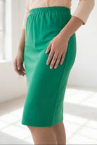 Model wearing Nuggles® 25" Classic Skirt in Kelly Green