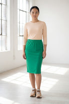 Model wearing Nuggles® 25" Classic Skirt in Kelly Green