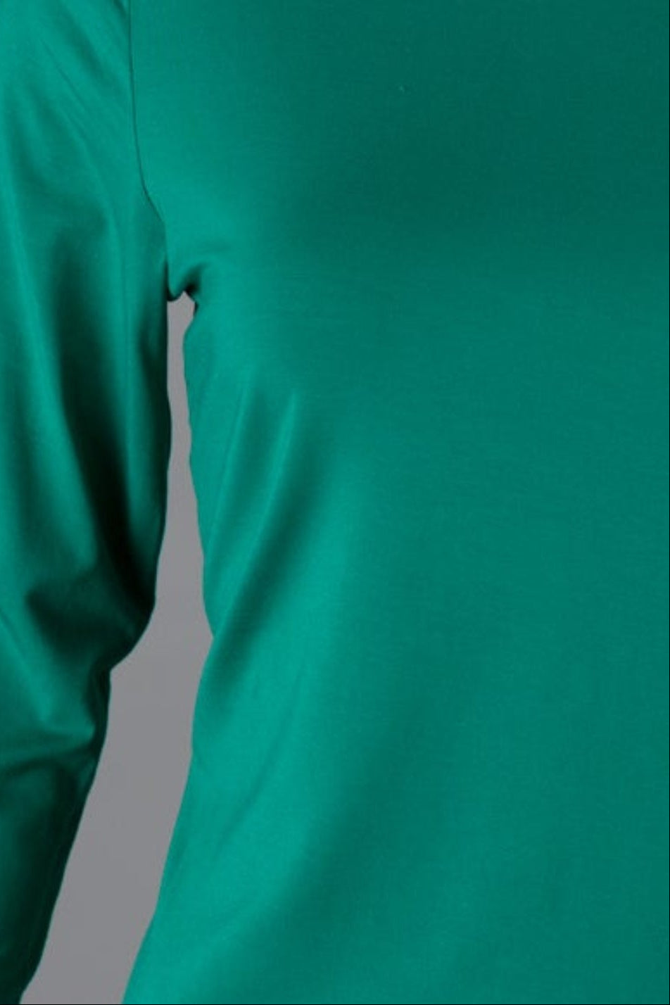 Model wearing Nuggles® 3/4 Essential Tee in Kelly Green