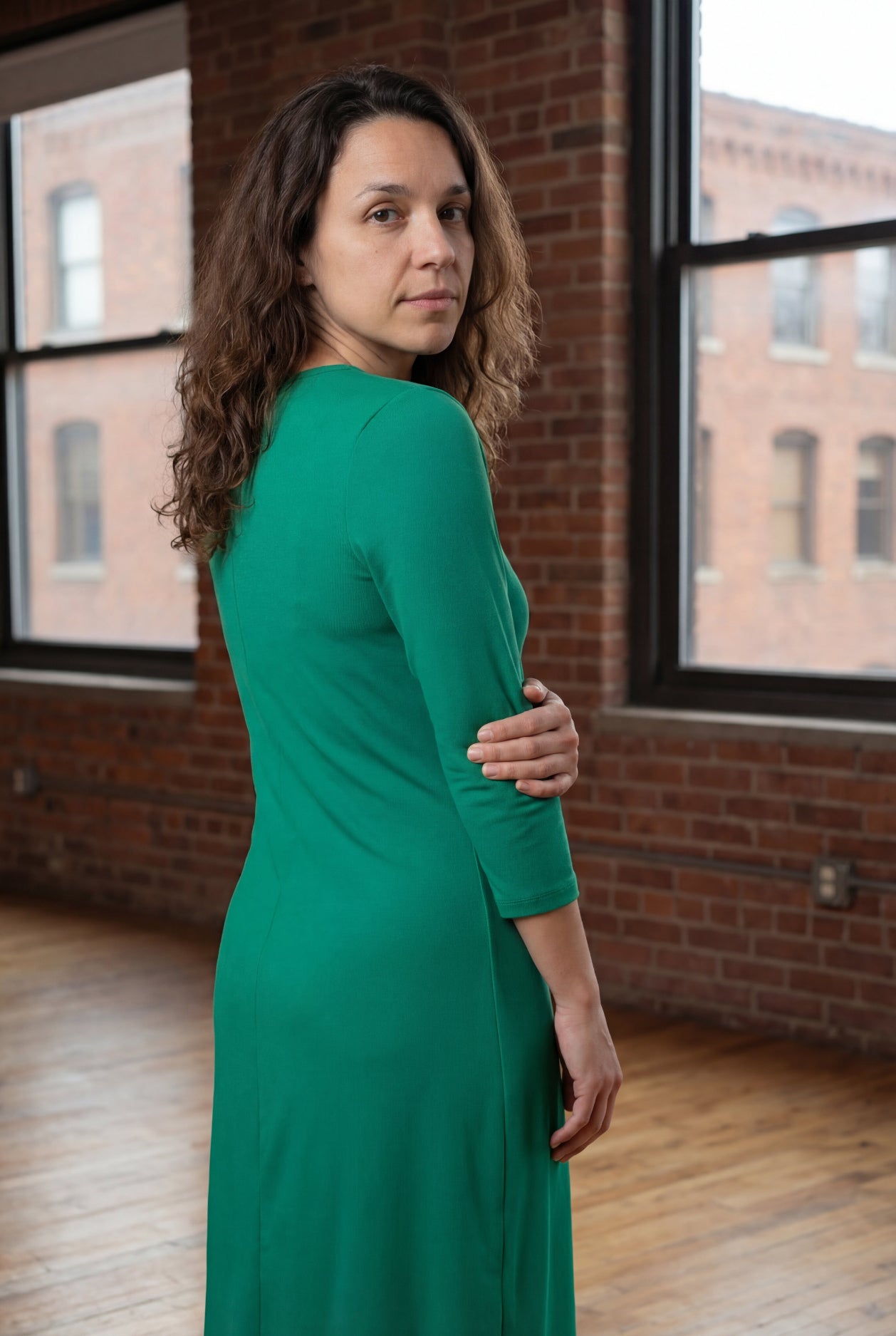 Model wearing Nuggles® Midi Layering Dress in Kelly Green
