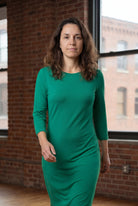 Model wearing Nuggles® Midi Layering Dress in Kelly Green