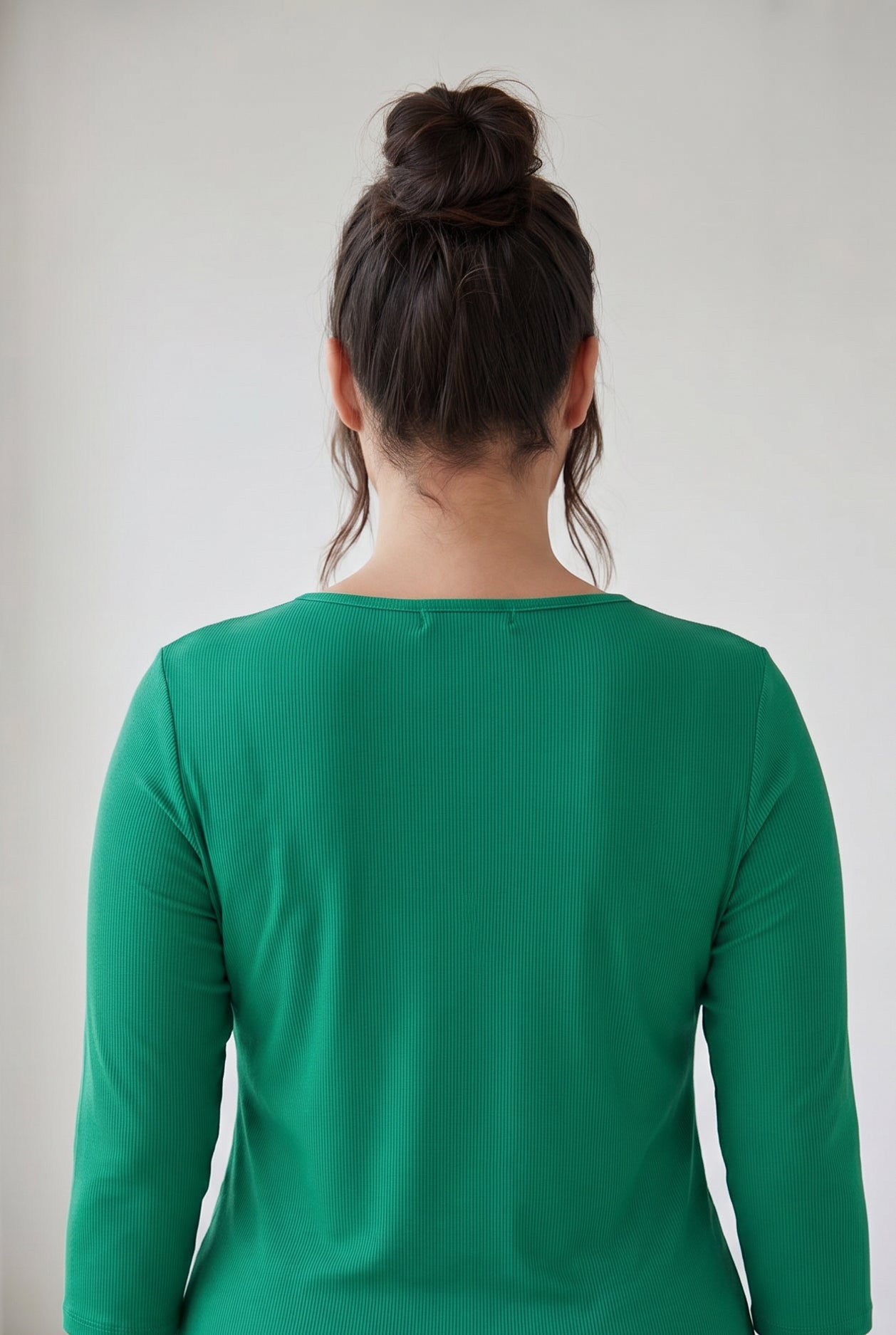 Model wearing Nuggles® 3/4 Essential Ribbed Tee in Kelly Green