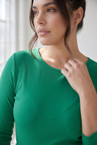 Model wearing Nuggles® 3/4 Essential Ribbed Tee in Kelly Green