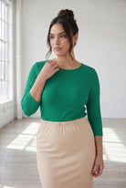 Model wearing Nuggles® 3/4 Essential Ribbed Tee in Kelly Green