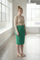 Model wearing Nuggles® 27" Classic Skirt in Kelly Green