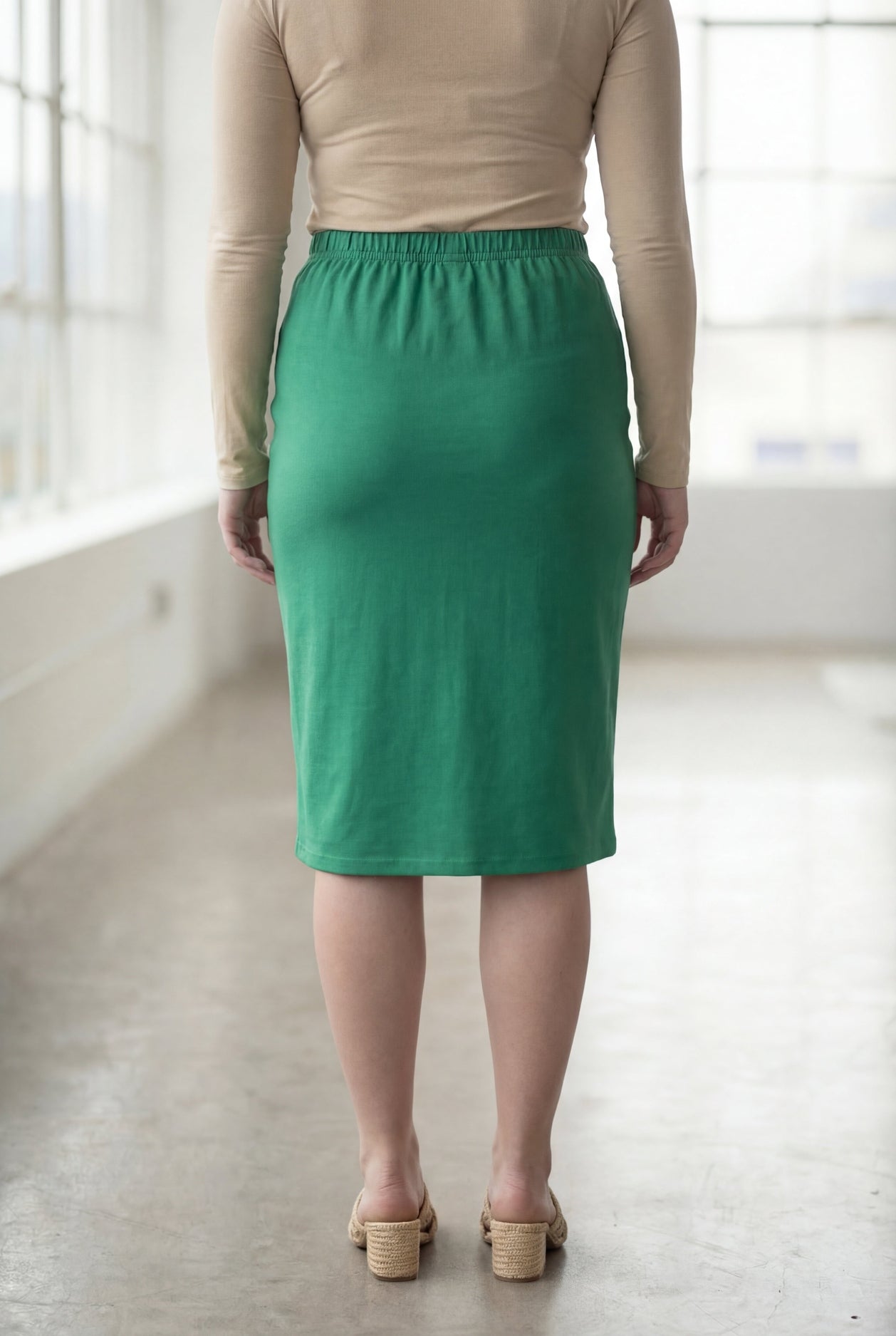 Model wearing Nuggles® 27" Classic Skirt in Kelly Green