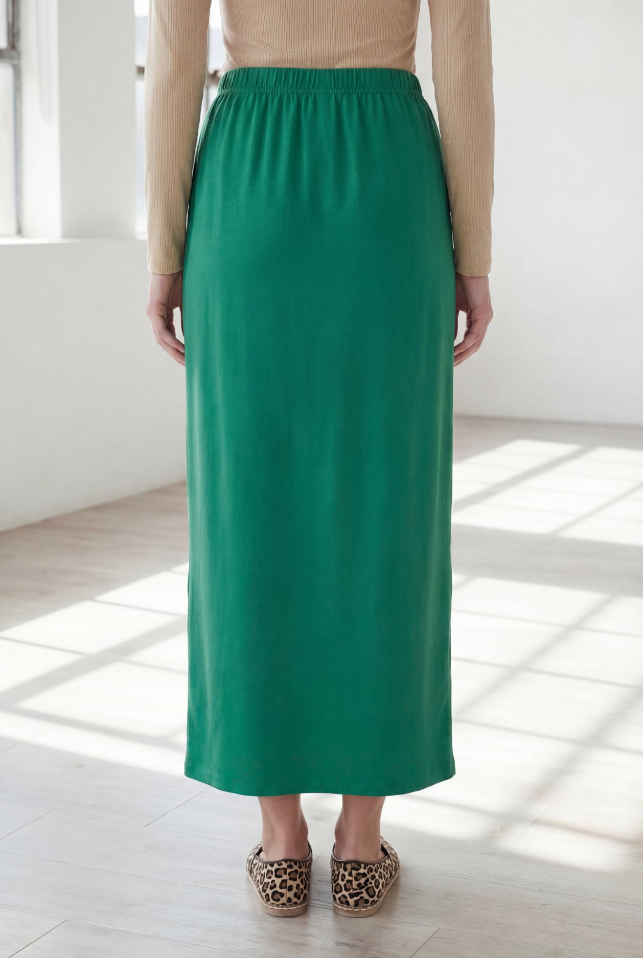 Model wearing Nuggles® 36" Classic Skirt in Kelly Green