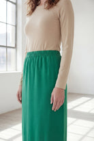 Model wearing Nuggles® 36" Classic Skirt in Kelly Green