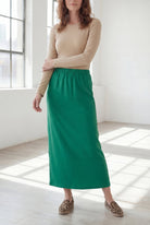 Model wearing Nuggles® 36" Classic Skirt in Kelly Green