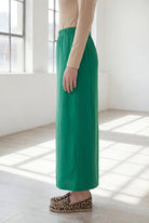 Model wearing Nuggles® 36" Classic Skirt in Kelly Green