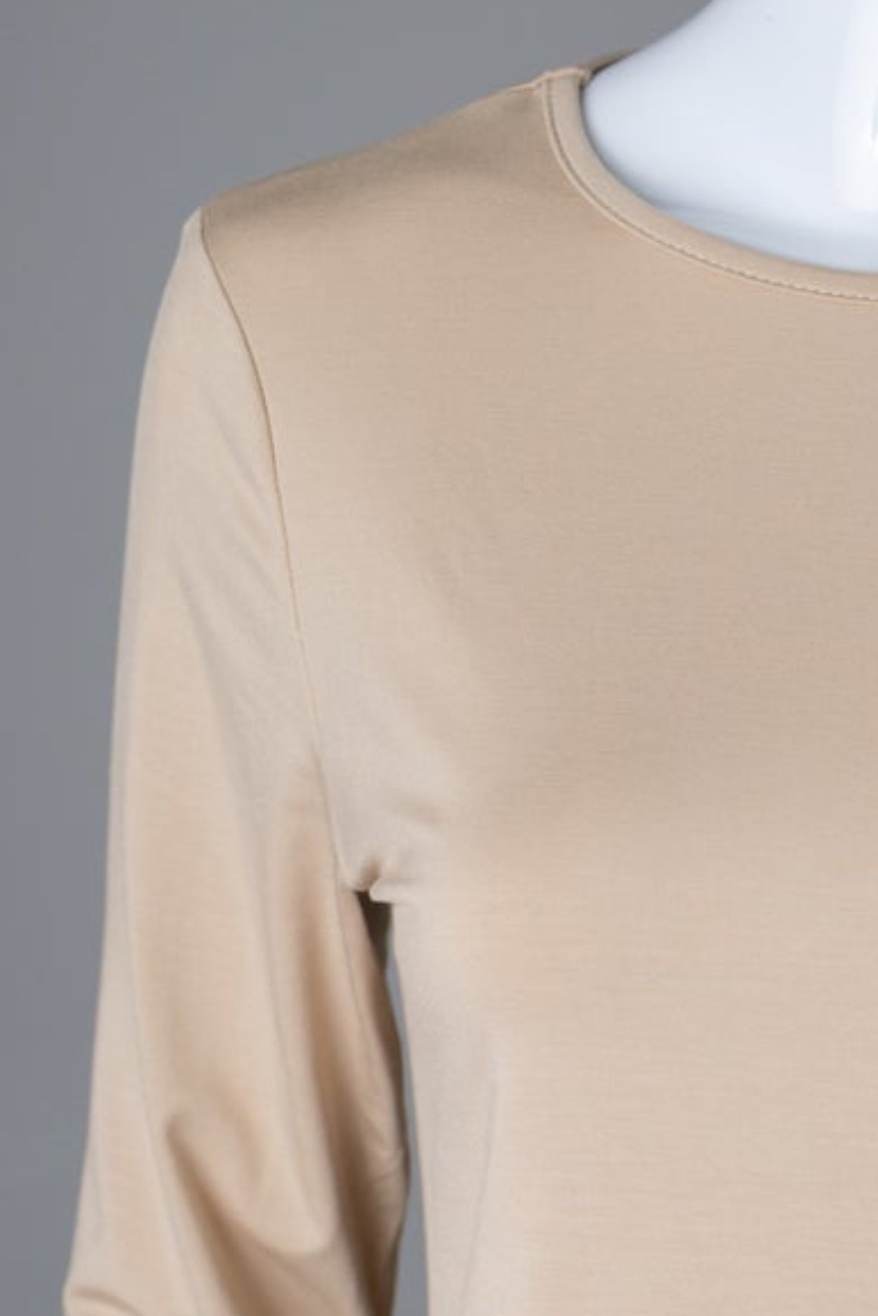 Model wearing Nuggles® 3/4 Essential Tee in Khaki