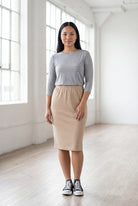 Model wearing Nuggles® 25" Classic Skirt in Khaki