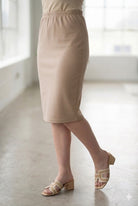 Model wearing Nuggles® 27" Classic Skirt in Khaki