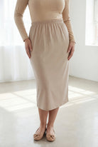 Model wearing Nuggles® 31" Classic Skirt in Khaki