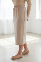 Model wearing Nuggles® 31" Classic Skirt in Khaki