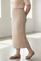 Model wearing Nuggles® 34" Classic Skirt in  Khaki