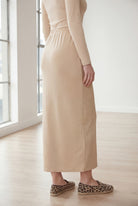 Model wearing Nuggles® 36" Classic Skirt in Khaki