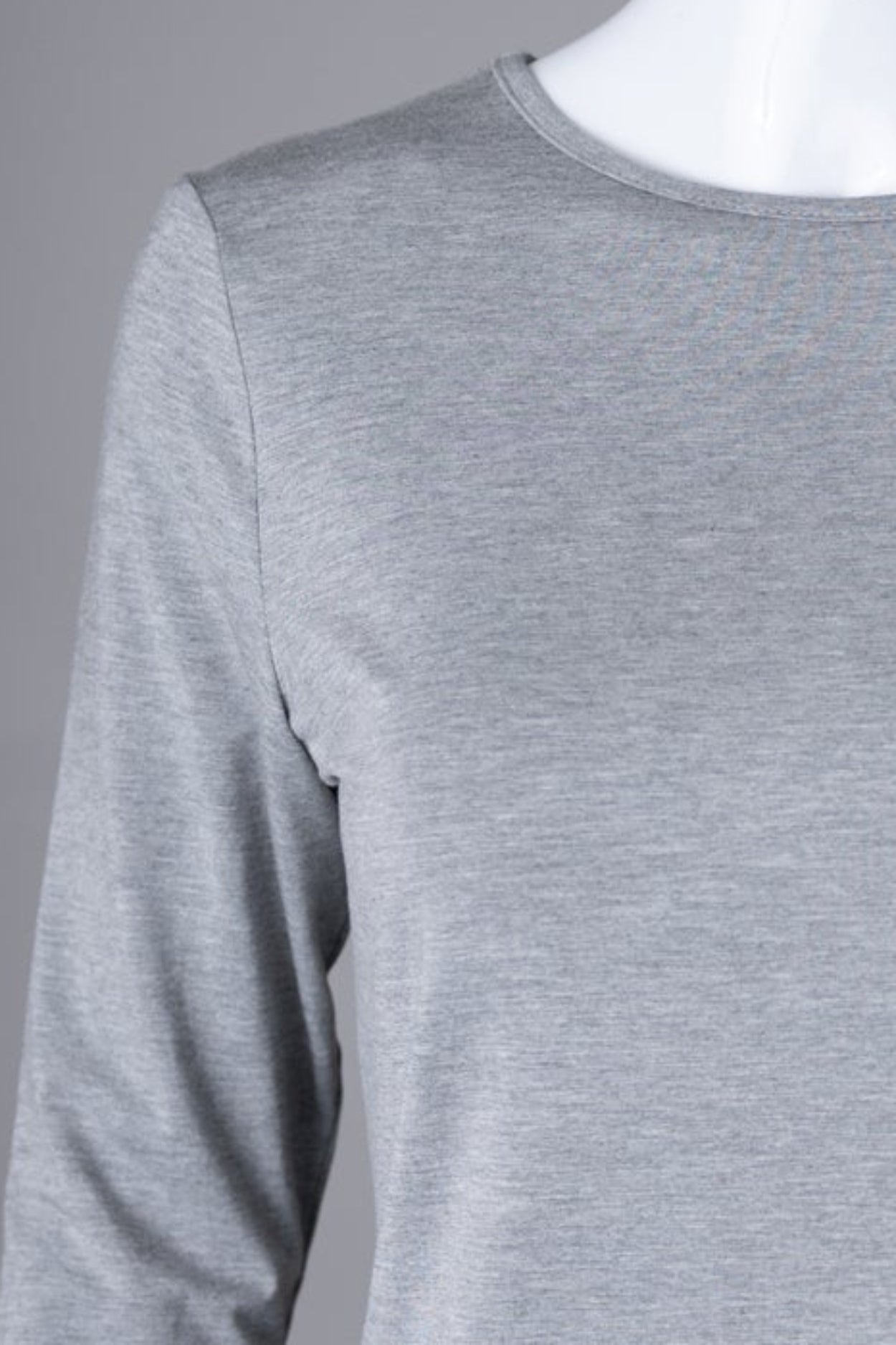 Model wearing Nuggles® 3/4 Essential Tee in Light Heather