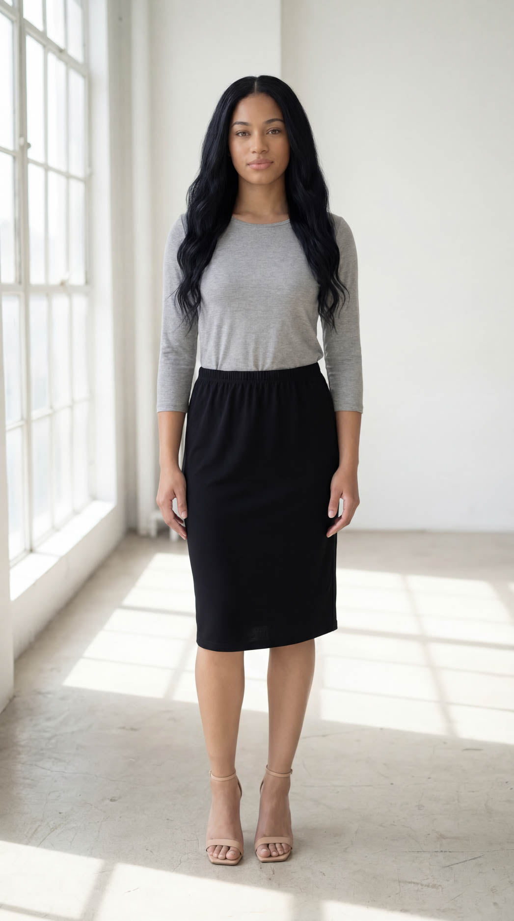 Model wearing Nuggles® 3/4 Essential Tee in Light Heather Gray