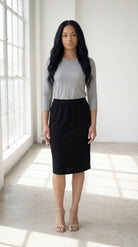 Model wearing Nuggles® 3/4 Essential Tee in Light Heather Gray