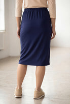 Model wearing Nuggles® 25" Classic Skirt in Navy