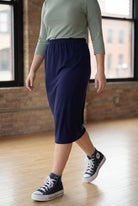 Model wearing Nuggles® 27" Classic Skirt  in Navy