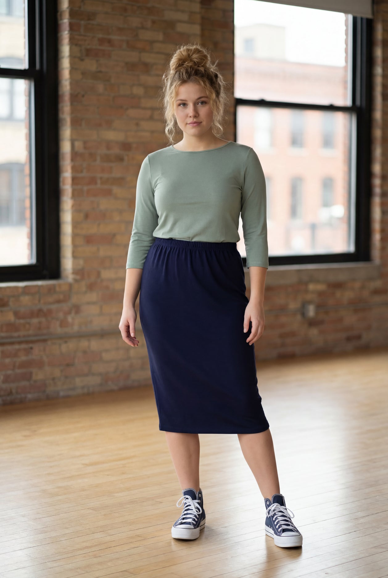 Model wearing Nuggles® 27" Classic Skirt in Navy