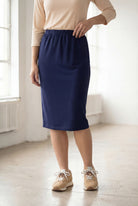 Model wearing Nuggles® 25" Classic Skirt in Navy