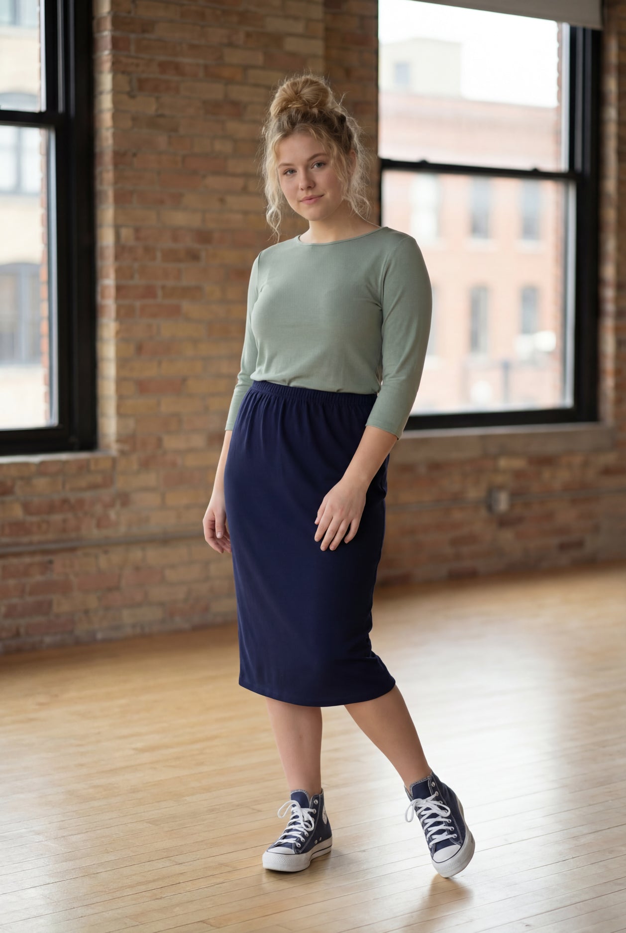 Model wearing Nuggles® 27" Classic Skirt in Navy