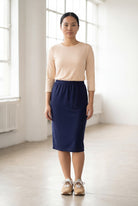 Model wearing Nuggles® 25" Classic Skirt in Navy