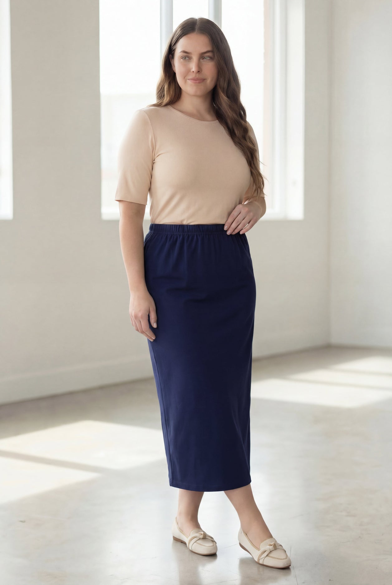 Model wearing Nuggles® 34" Classic Skirt in Navy