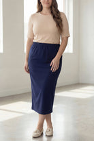Model wearing Nuggles® 34" Classic Skirt in Navy