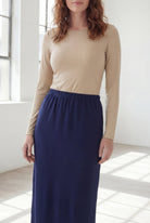 Model wearing Nuggles® 36" Classic Skirt in Navy