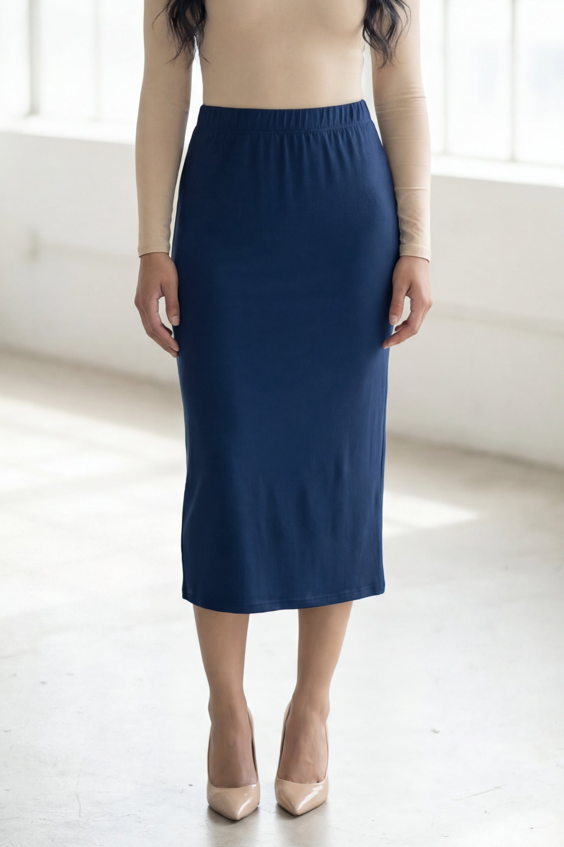 Model wearing Nuggles® 31" Lightweight Lined Pencil Skirt  in Navy