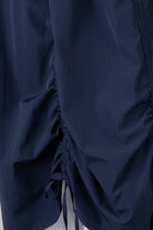 Model wearing Nuggles® Oriana Skirt in Navy