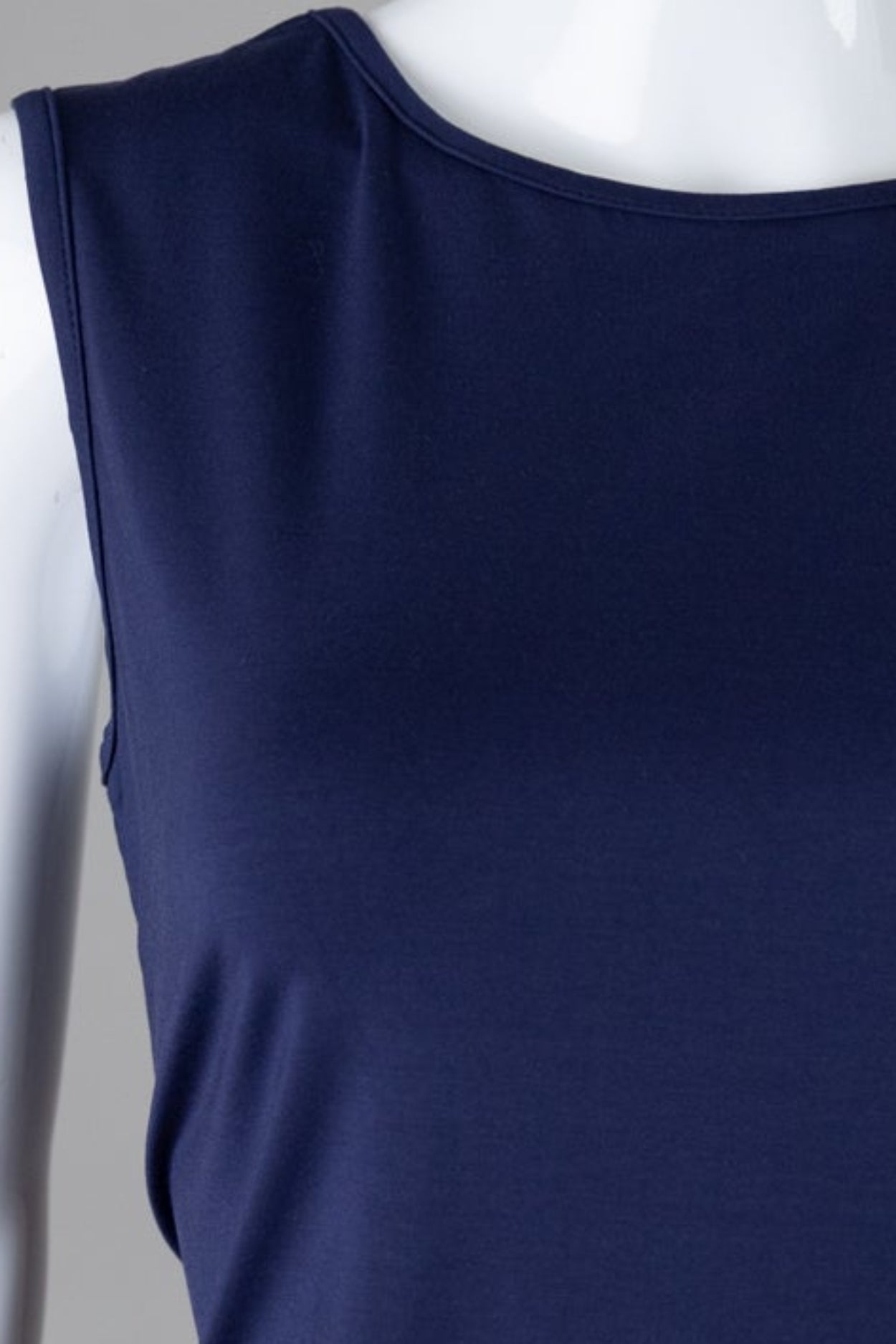 Model wearing Nuggles® Essential Tank in Navy