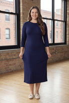 Model wearing Nuggles® Midi Layering Dress in Navy