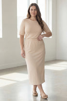 Model wearing Nuggles® 34" Classic Skirt in Nude