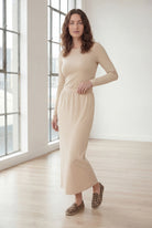 Model wearing Nuggles® 36" Classic Skirt in Nude