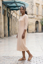 Model wearing Nuggles®  Midi Layering Dress in Nude
