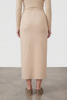 Model wearing Nuggles® 36" Classic Skirt in Nude