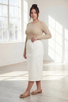 Model wearing Nuggles® 31" Classic Skirt in Off White