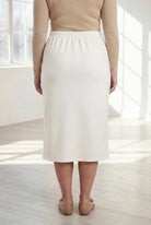 Model wearing Nuggles® 31" Classic Skirt in Off White