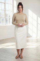 Model wearing Nuggles® 31" Classic Skirt in Off White