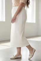 Model wearing Nuggles® 34" Classic Skirt in Off White