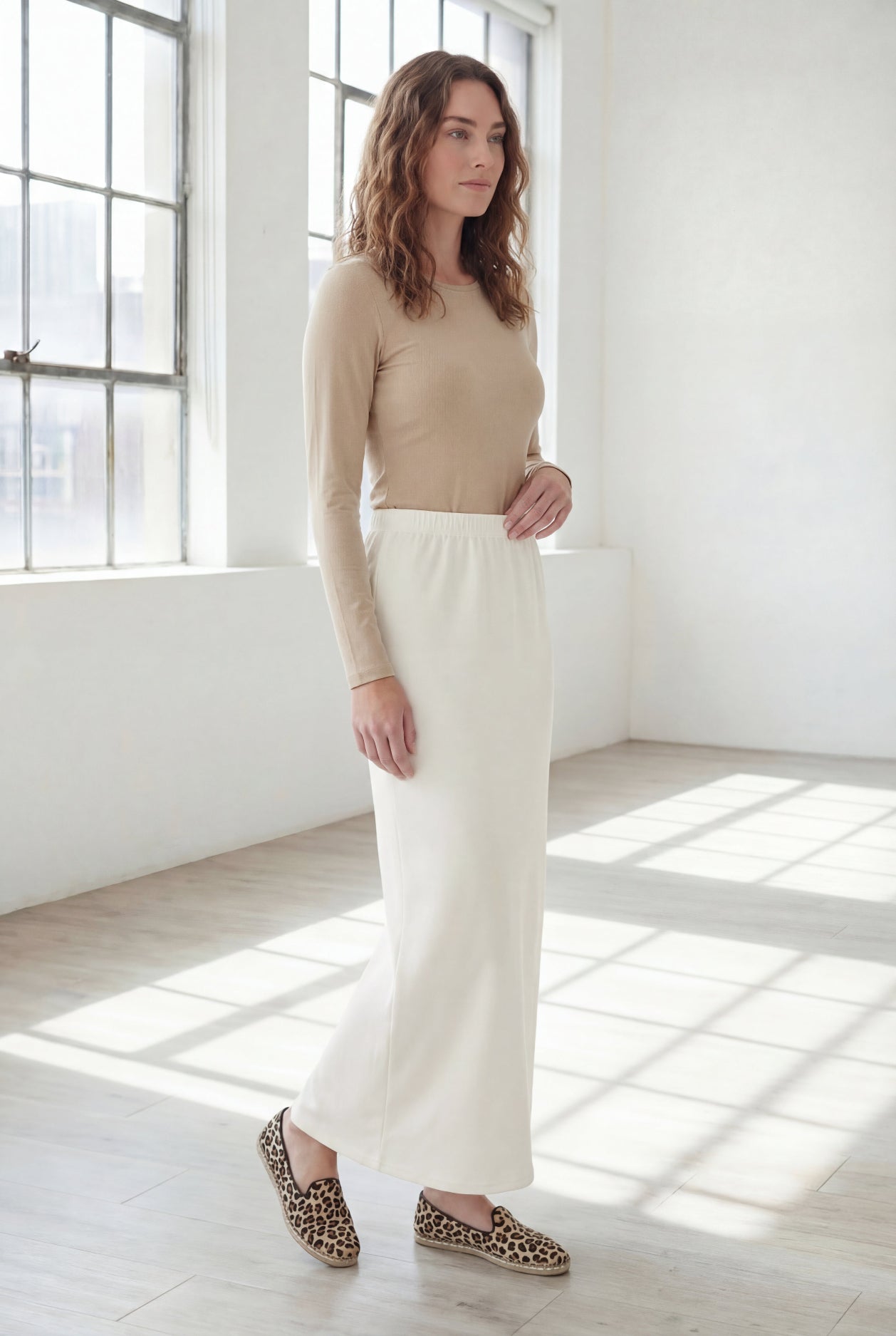 Model wearing Nuggles® 36" Classic Skirt in Off White