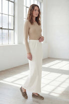 Model wearing Nuggles® 36" Classic Skirt in Off White